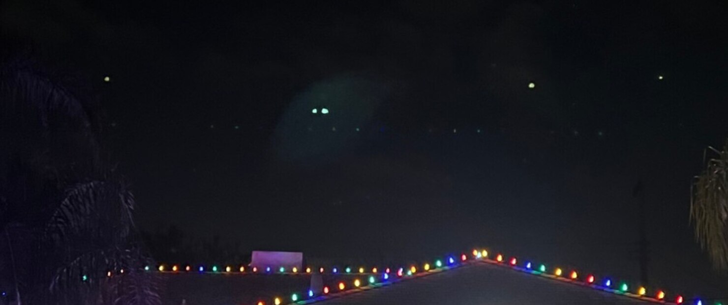 Professional christmas lights in Elk Grove, CA: multicolor c9 roofline run hip roof